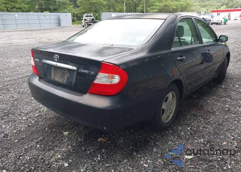 2003 Toyota Camry Le z USA, uszkodzony, nr VIN 4T1BE32K83U236639